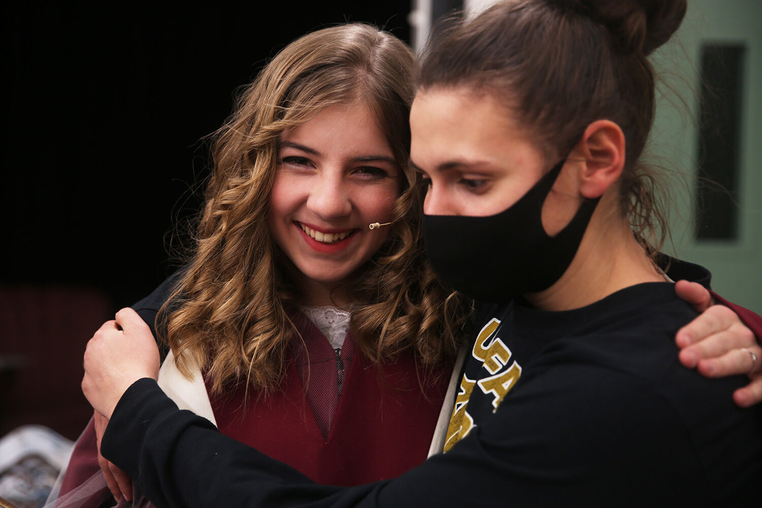 Laurel Rozema hugs angel Elizabeth Farris